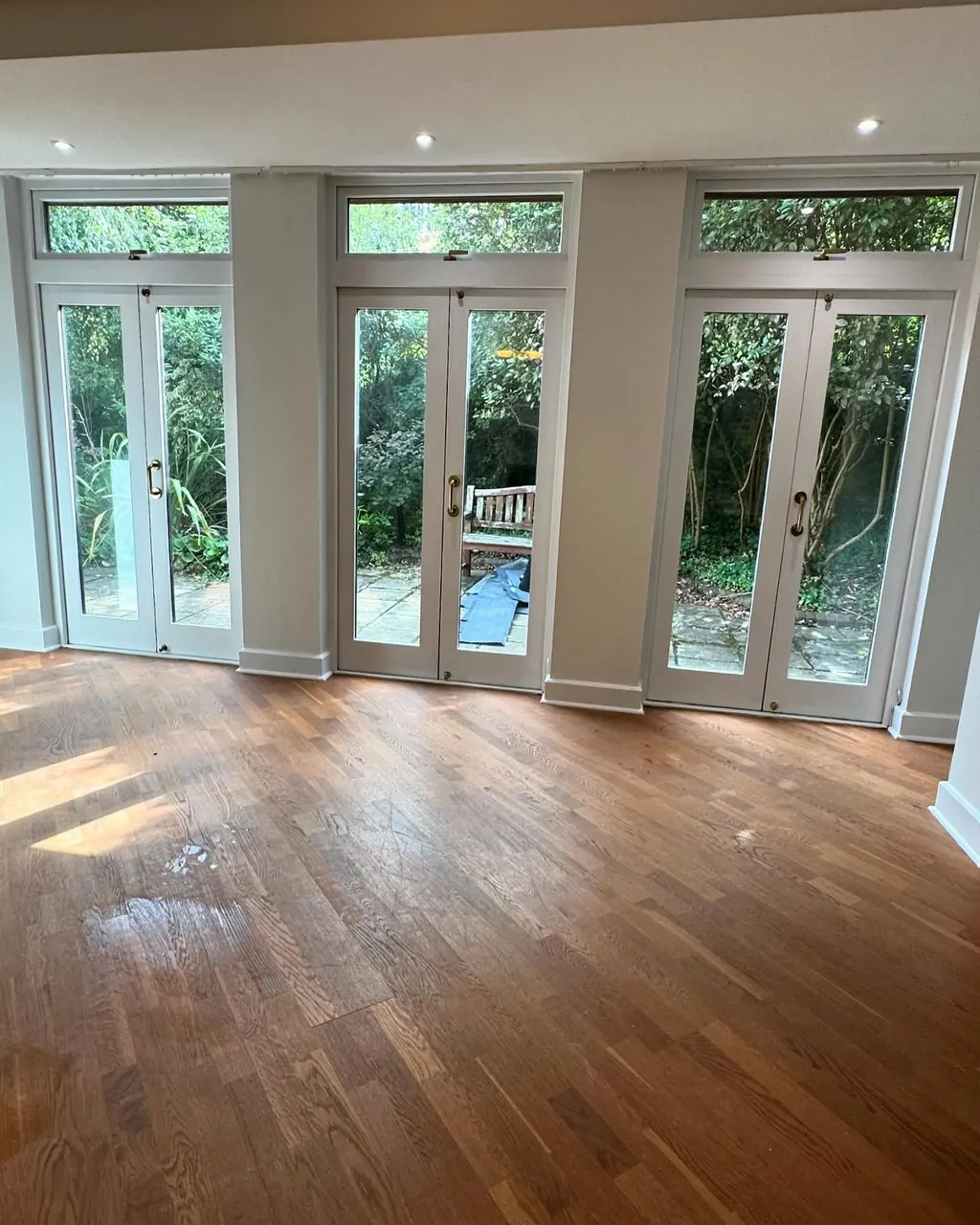 Timber French doors repainted in soft grey