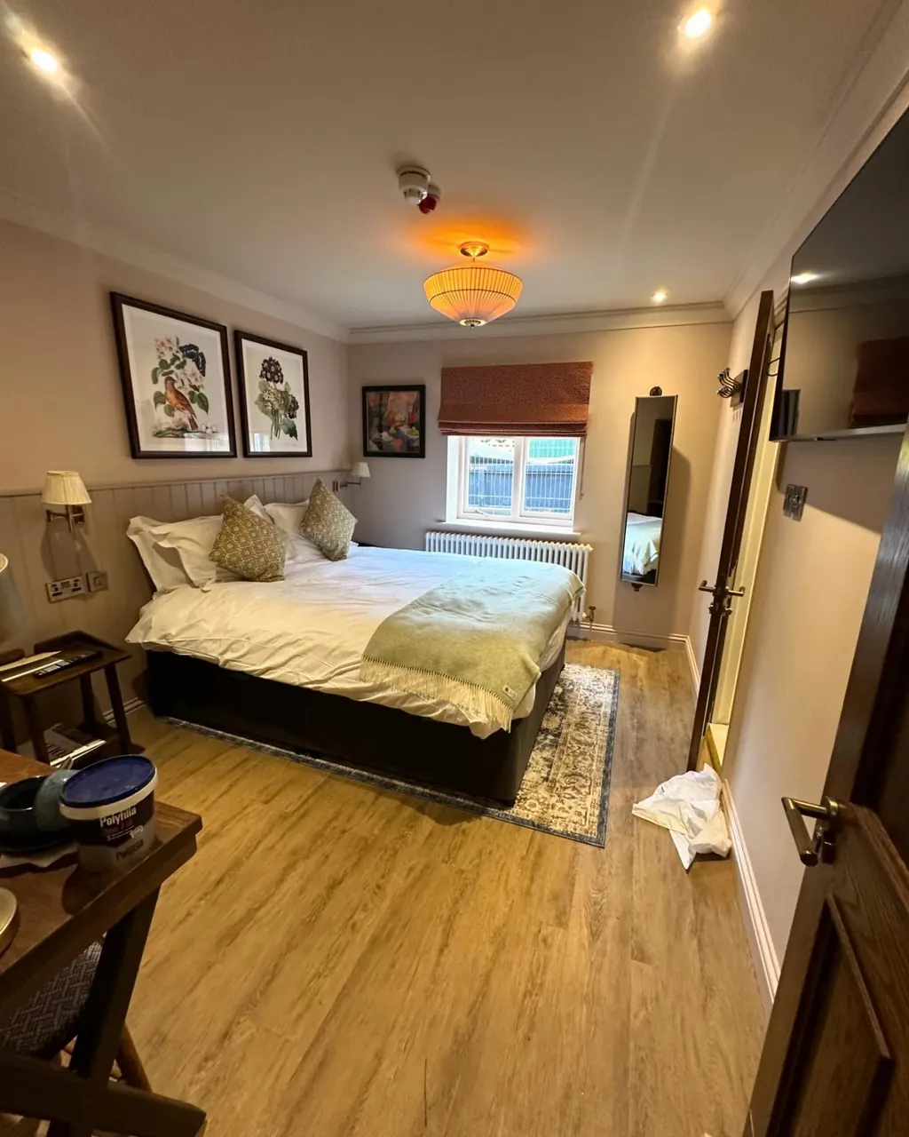 Guest bedroom decorated in warm tones
