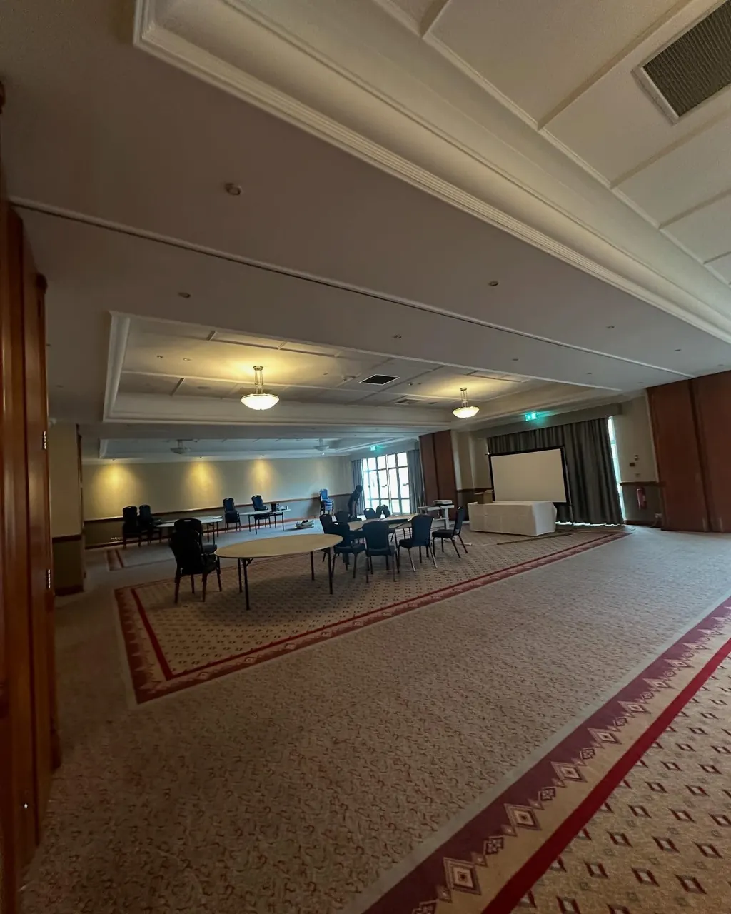 Conference room redecorated with detailed ceiling