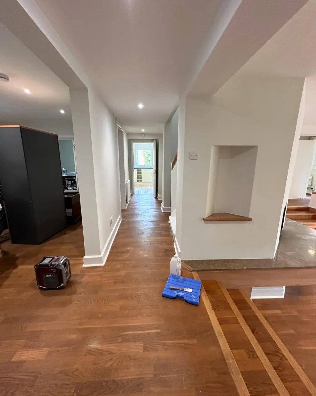 Hallway and landing painted white during an interior decorating job