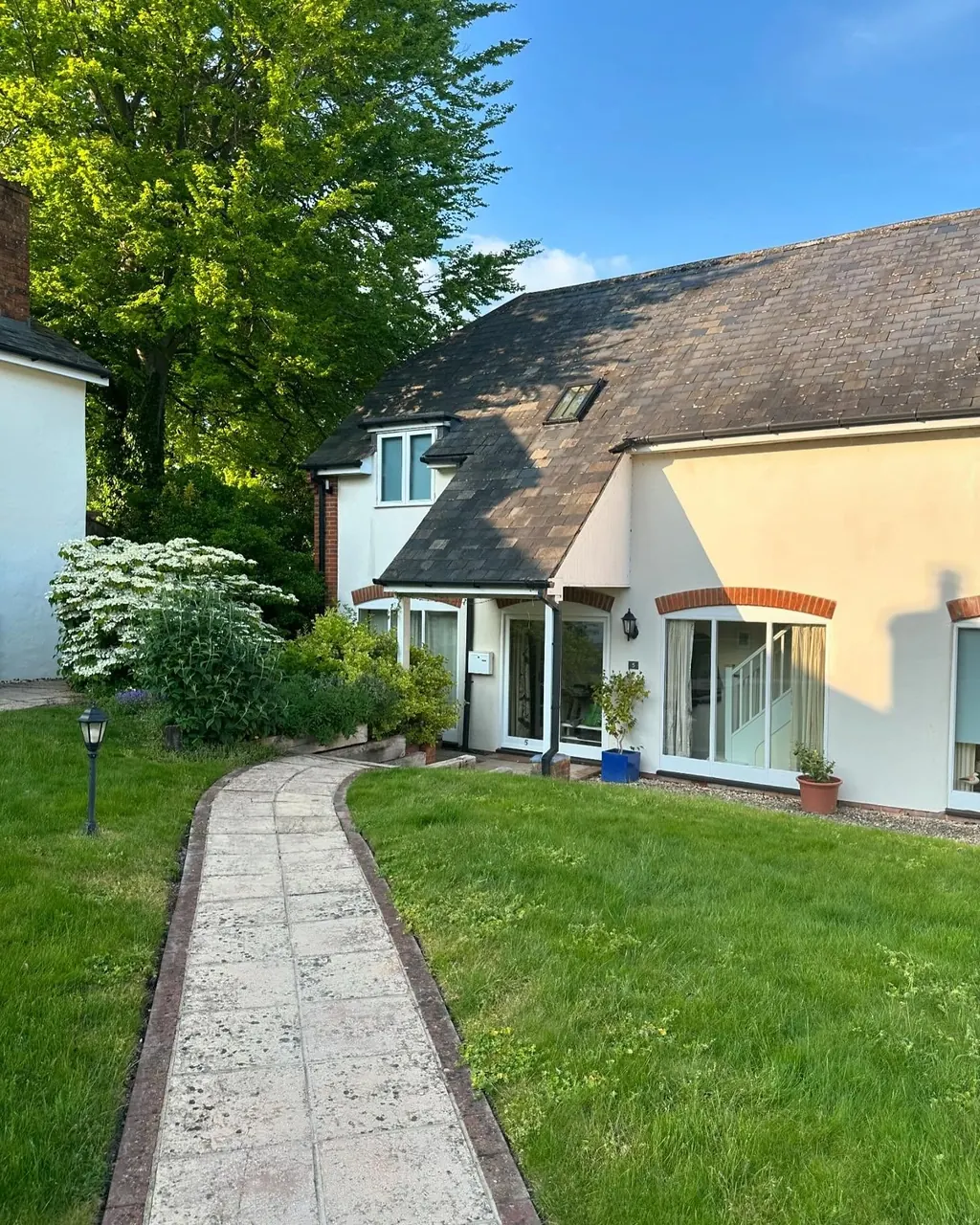 Rendered house after exterior painting and decorating